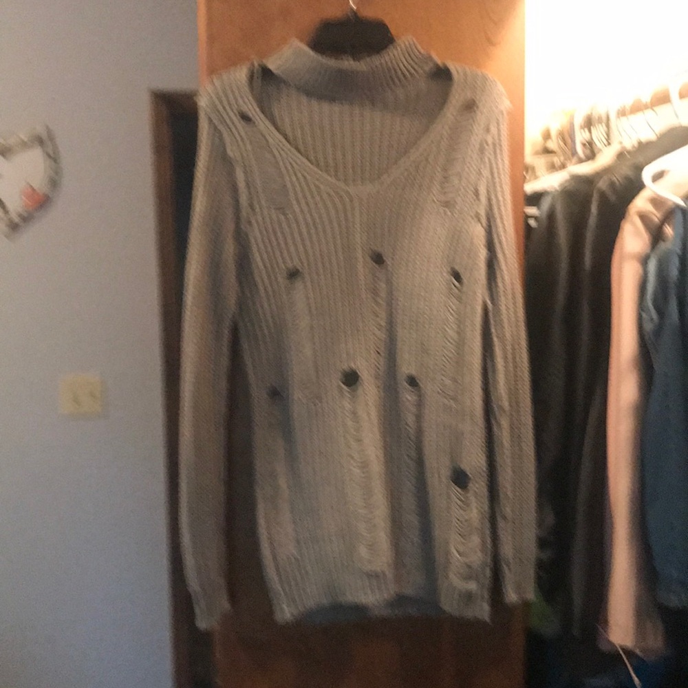Distressed sweater